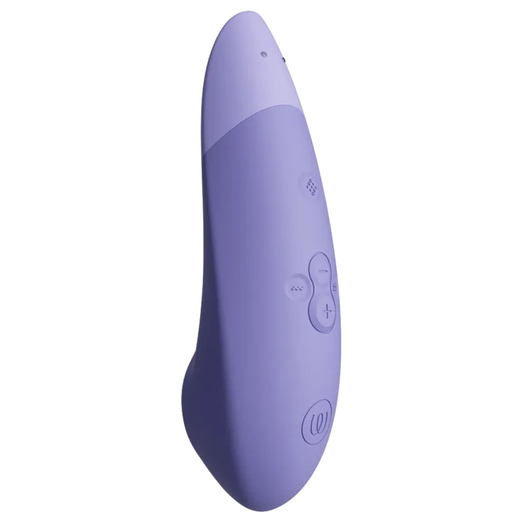 Womanizer Enhance lufttryksvibrator fra Womanizer kollektionen hos Nevola; elegant lavendelfarvet design i silikone med ergonomisk form og intuitive knapper, der giver målrettet klitorisstimulering gennem stille og effektiv Pleasure Air-teknologi.