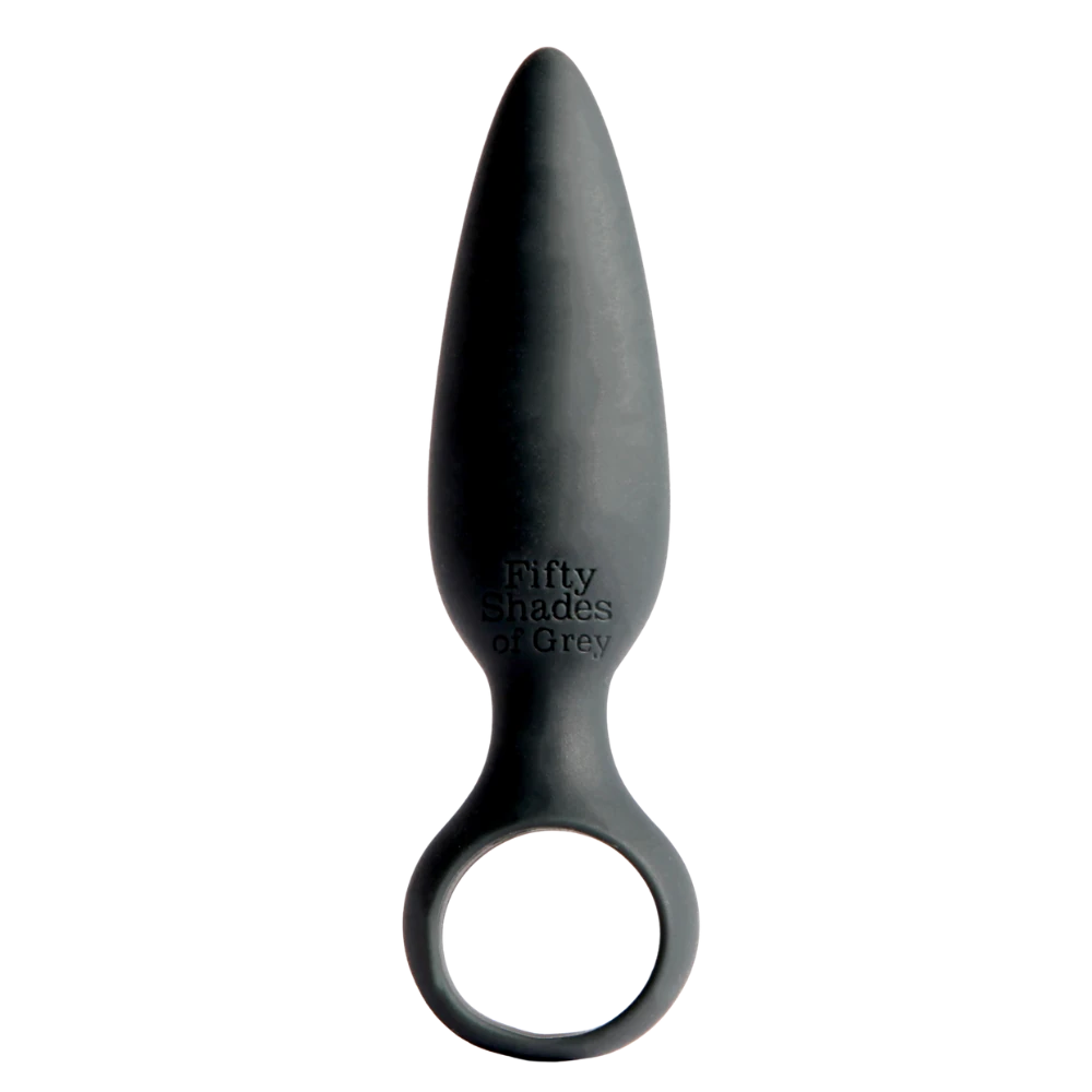 Fifty Shades of Grey silikone butt plug i grå med konisk form og rund base; kropssikker, fleksibel og begyndervenlig anal plug designet til blid stimulering, tryg pasform og diskret nydelse i hverdagen.