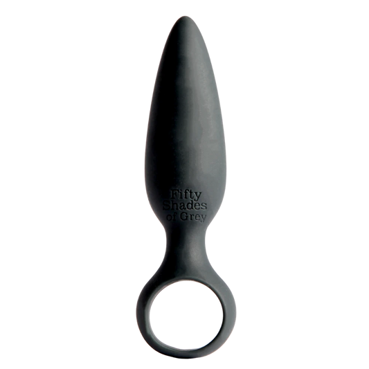 Fifty Shades of Grey Silikone Butt Plug i klassisk sort design. Den koniske form og den sikre base med fingerhul giver komfort og kontrol ved brug.