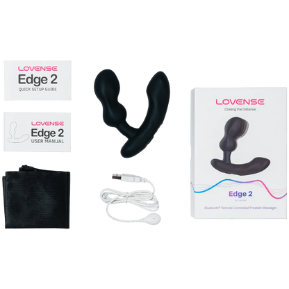 Lovense Edge 2 prostata vibrator til mænd i sort vist med indhold: manual, opbevaringspose og oplader. Eksklusivt app-styret sexlegetøj i medicinsk silikone, designet til intens nydelse og diskret oplevelse.