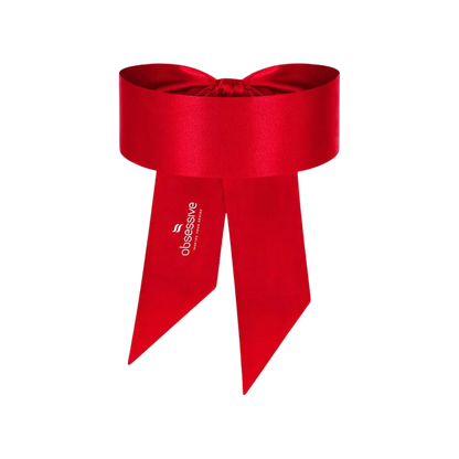Rød satin sløjfe fra Obsessive designet som sensuelt kropsaccessory. Perfekt til romantiske anledninger eller gaveindpakning af kroppen, med bredt bånd og elegant finish for et frækt, stilrent look.