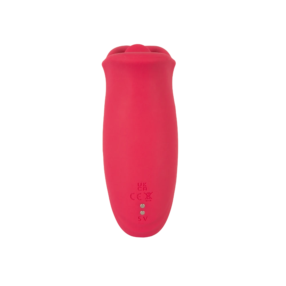 Bagsiden af Oral Fun Vibrator med opladningspunkter og produktmarkeringer