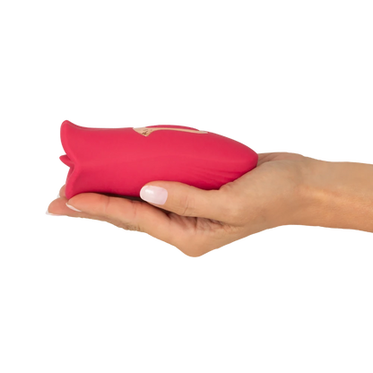 Oral Fun Vibrator holdt i hånden som størrelsesreference