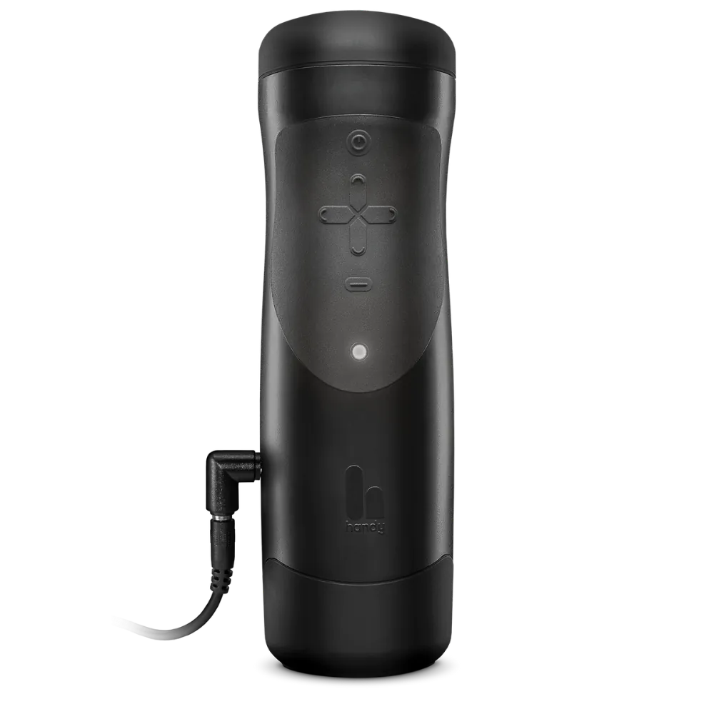 The Handy 1 med emballage set forfra. Viser det stilrene design og minimalistiske kontrolpanel med tydeligt logo og LED-lys.