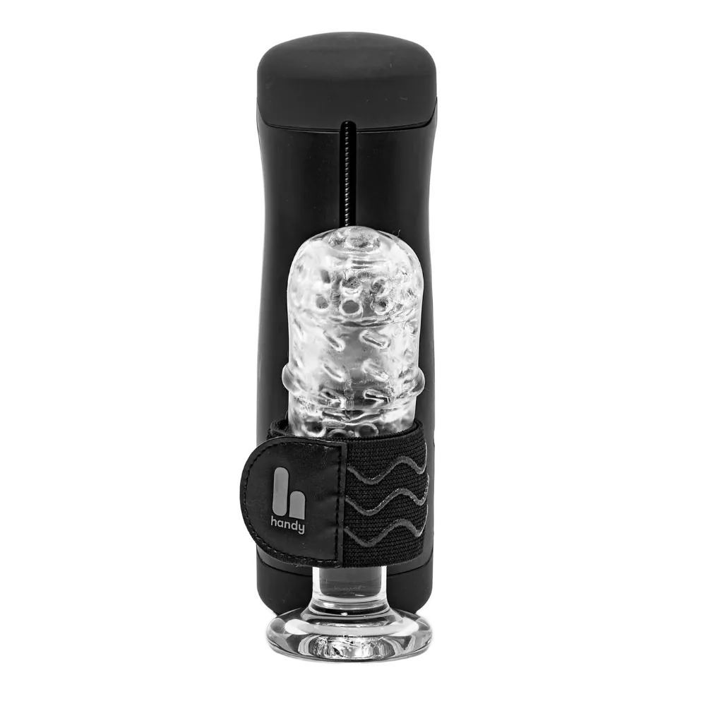 Kvinde i sort blondebody viser The Handy 1 i hånden. Et æstetisk lifestyle-billede, der fremhæver produktets størrelse og elegante design.