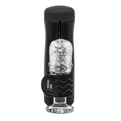 Kvinde i sort blondebody viser The Handy 1 i hånden. Et æstetisk lifestyle-billede, der fremhæver produktets størrelse og elegante design.