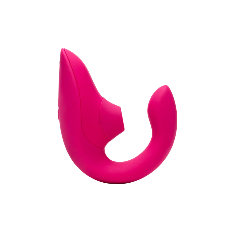 Sideprofil af Womanizer Blend sexlegetøj i pink. Produktbillede der fremhæver lufttryksvibratorens buede ergonomiske design og klitorisstimulator til præcis stimulering.