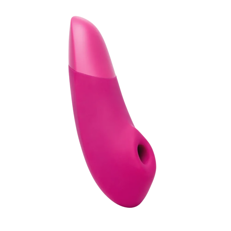 Womanizer Enhance i pink variant, elegant klitoris stimulator med Pleasure Air teknologi. Intuitivt design med 10 intensiteter og vibrationer, skabt til intens nydelse og komfort i brug.