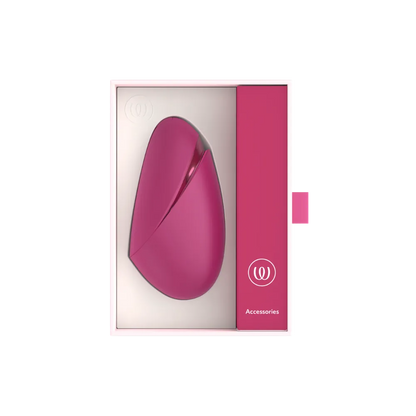 Womanizer Next Liberty placeret i den originale rosa æske med tilbehørsrum