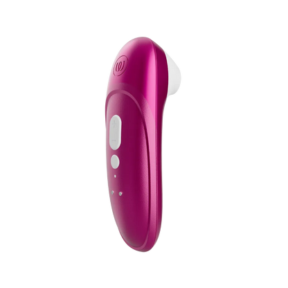 Womanizer Pro klitorisstimulator i vibrant pink set fra siden. Premium sexlegetøj til kvinder med karakteristisk stimuleringstop og ergonomisk form designet til komfortabel og præcis lufttryksstimulering.